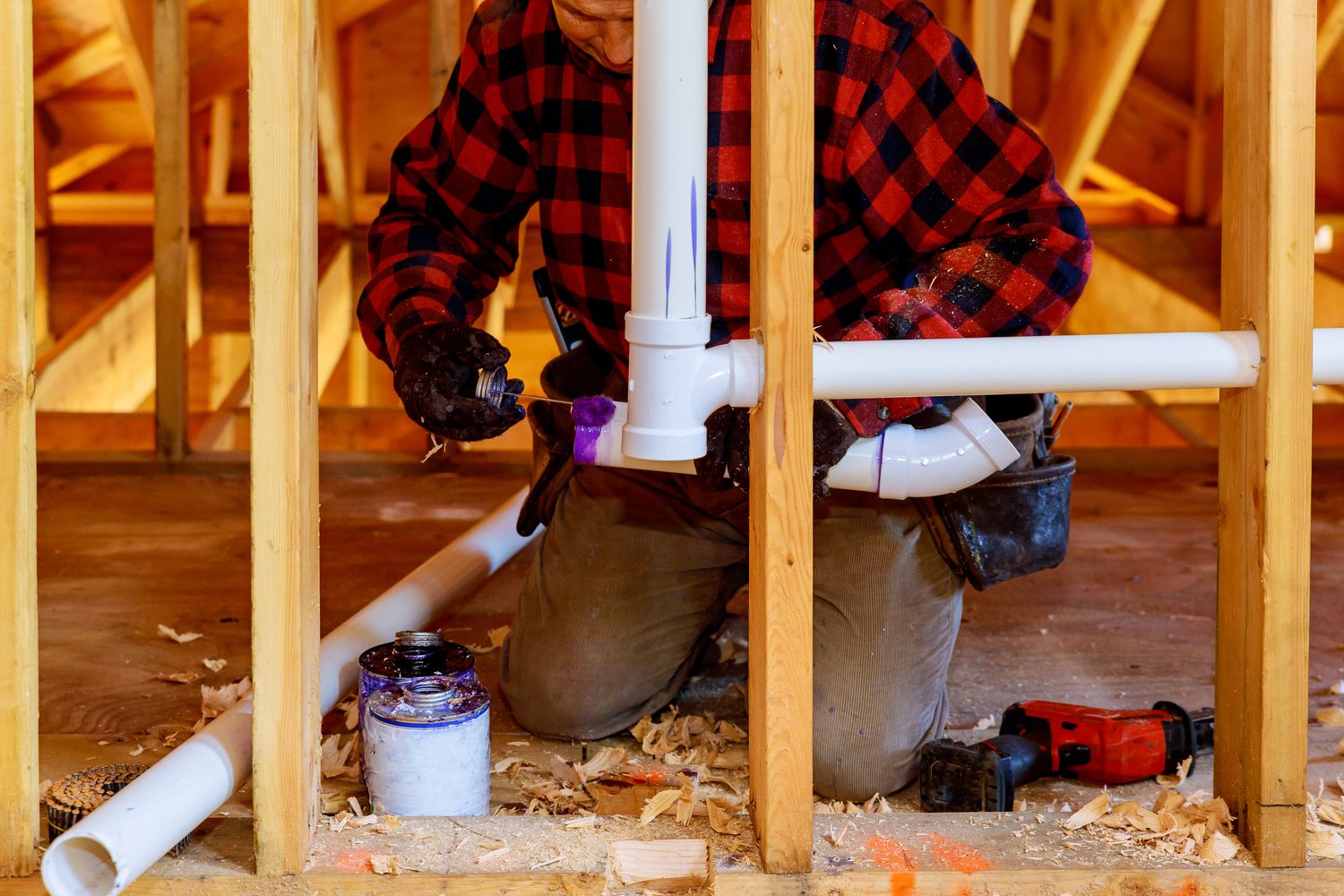 Handyman Installing Plumbing System 